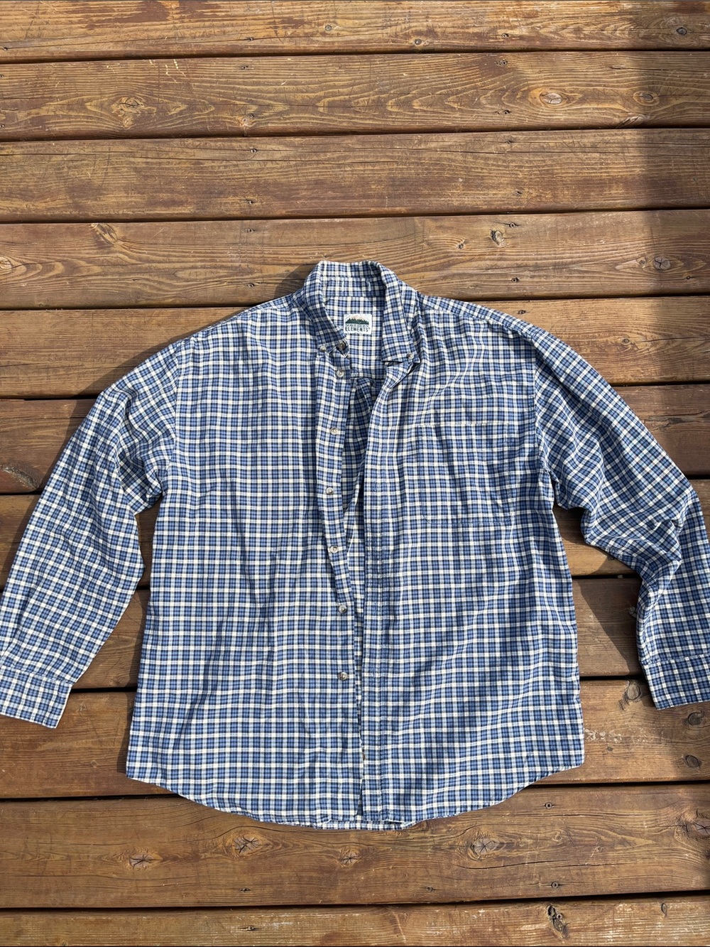Northern Elements blue and cream plaid shirt